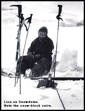 Tea break on Snowdome, during a 5 minute cloud lift. Note the snow block cairn.